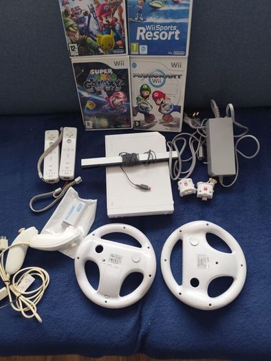 Wii with Mario kart, Sports resort, Mario Galaxy, Smash Brawl and HDMI