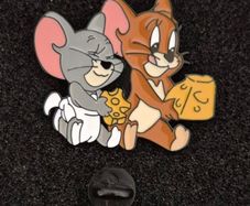 Tom and jerry,  pin back badge.