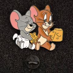 Tom and jerry,  pin back badge.