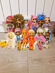 twelve OMG dolls