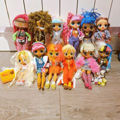 twelve OMG dolls