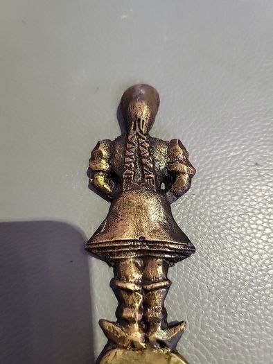 Bottle opener brass vintage