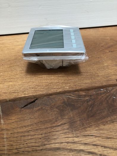 Chrome/Stainless Programable thermostat