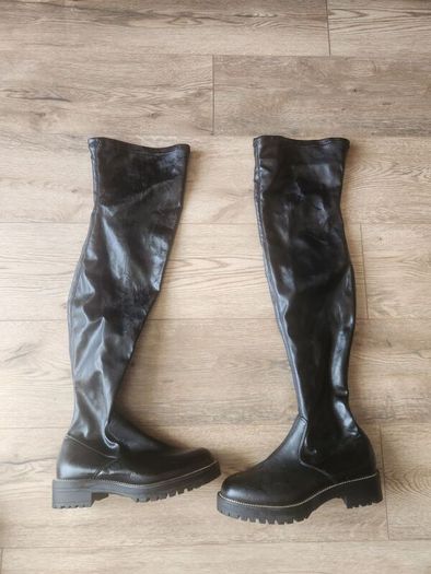 Over the knee black boots never used tried on in house.