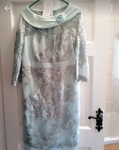 occasion dress, new with tags, cost 540 e