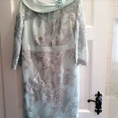 occasion dress, new with tags, cost 540 e