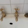 Traditional style brass bathroom taps and toilet flush handle Image 2