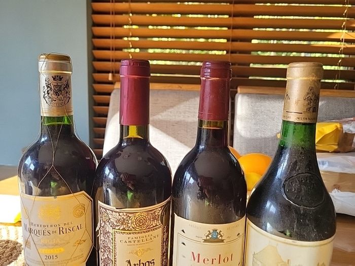 Full unopened wine bottles for display