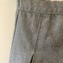 Dunnes grey skirt (as new) age 8-9 Image 2