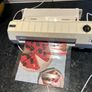 Laminator with laminating pouches Image 4