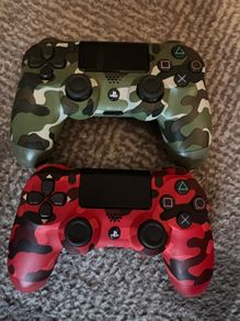 A Pair of Camo PS4 controllers