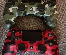 A Pair of Camo PS4 controllers
