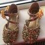 . Brand new in box , pair of girls gold shoes Image 2