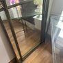 Metal framed hall mirror and matching glass top table Image 2