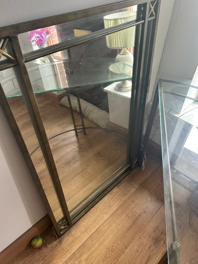 Metal framed hall mirror and matching glass top table