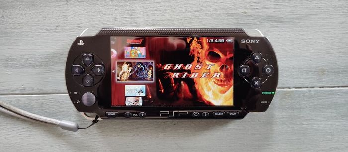 Psp 1000 Modded 64gb 40 psp original charger Excellent condition