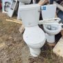 Bathroom sink and toilet Image 4