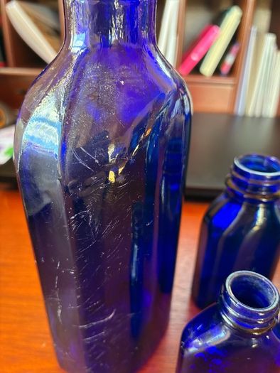 Antique bottles milk of magnesia