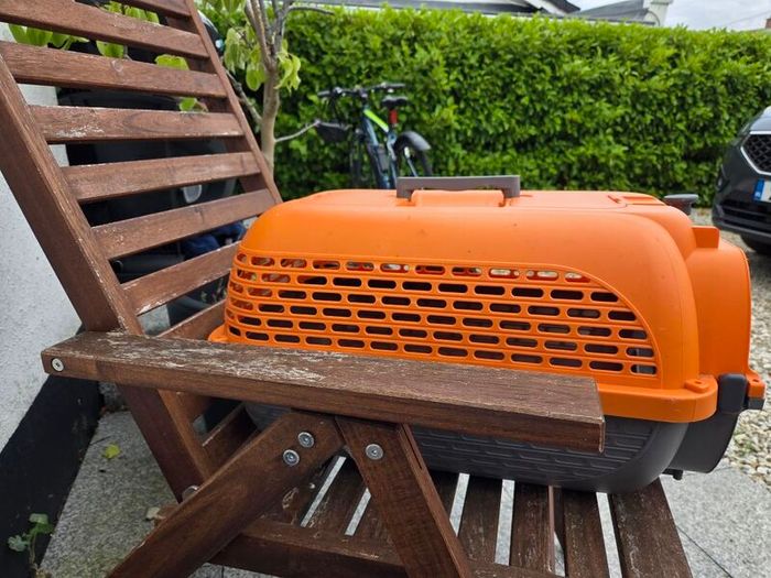 Dogit Voyageur Pet Carrier (Small size) in bright orange and charcoal.