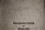 Commemorative note book signed by two Stoke City players. 2012