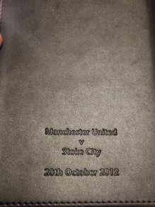 Commemorative note book signed by two Stoke City players. 2012