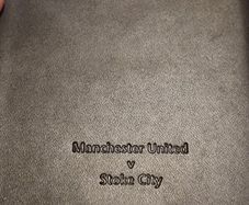Commemorative note book signed by two Stoke City players. 2012