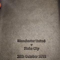 Commemorative note book signed by two Stoke City players. 2012