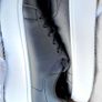 Black sneakers with thick white sole Image 5