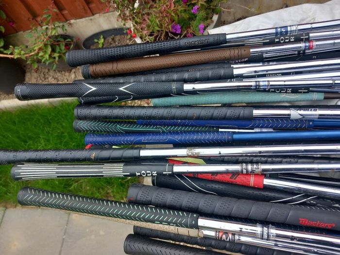 A selection of golf clubs and bags. NOT SELLING SEPARATE