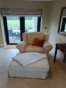cream armchair 105cm w x 83cm d (pair available) + footstool extra
