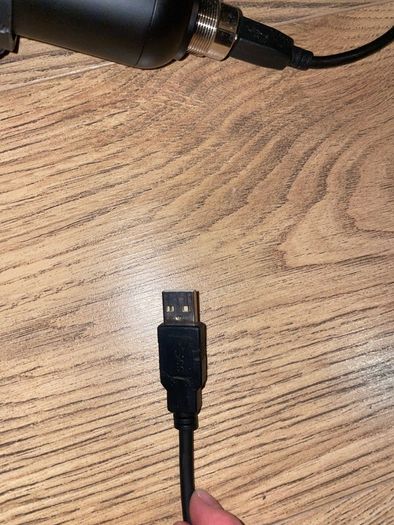 Microphone with arm