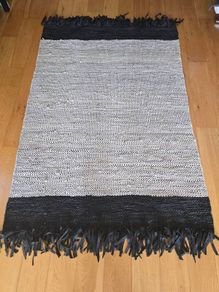 Black and white leather rug