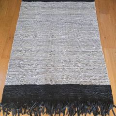 Black and white leather rug