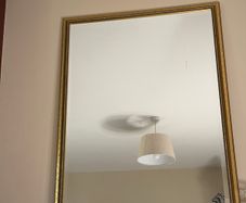 Gold bevelled metal mirror