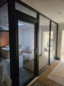 PVC door and glass panels