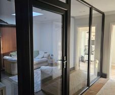 PVC door and glass panels