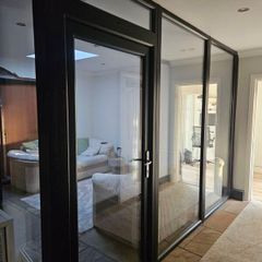PVC door and glass panels