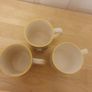 Mugs/Ceramic Mugs (4). .. "Ideal for Shelf Display in a Cafe or Kitchen"  Cream with Yellow and Blue Image 5