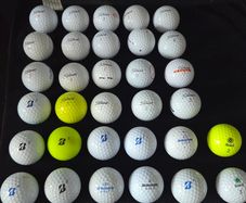 32 Titleist, Bridgestone,  seed balls