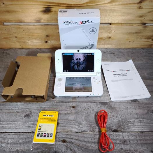 New Nintendo 3ds xl pearl white 64gb sd card hshop 1000s free games