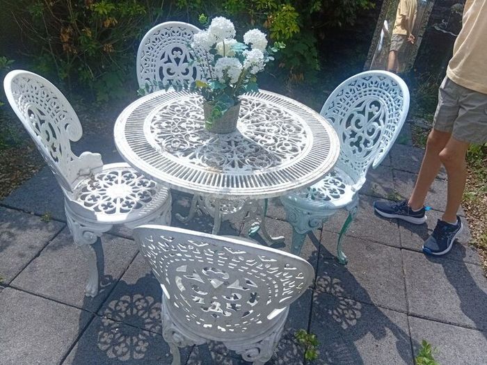 cast iron table and chairs