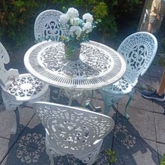 cast iron table and chairs