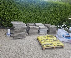 30sq m used 300mm x 600mm paving slabs & paving sand