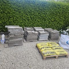30sq m used 300mm x 600mm paving slabs & paving sand
