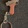 Keyring, firearms, luger. Nagant, glock, colt. Image 4