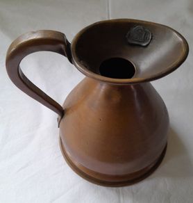 Antique brass pint jug