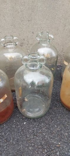 13 x demi johns,glass jars ,used condition, needs a clean,,buyer collects,,10 euros each or a deal  for the 13 ,sold as is