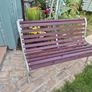 Garden bench, cast iron, beautiful design, restored seat, outdoor garden seating, treated timber decorations, furniture patio decking, great present. Ignore flowers, pots, plants, garden statue, chair, swing, patio table, balcony. Image 2