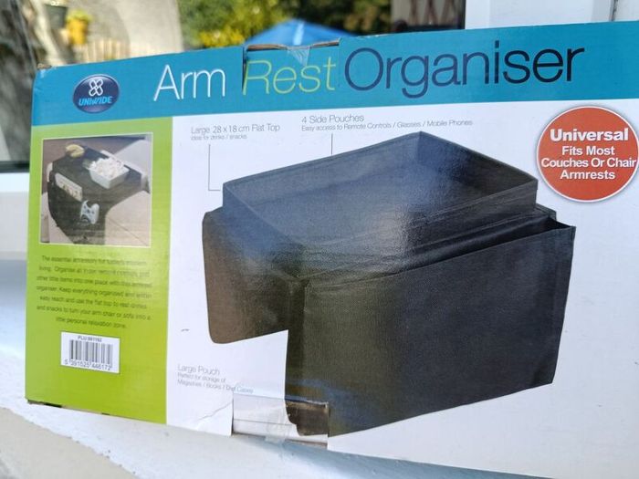 TV arm rest organiser