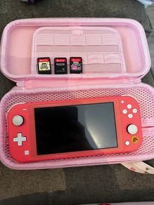 Nintendo switch with three games